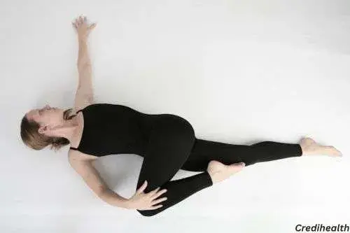 Supine spinal twist (Supta Matsyendrasana)